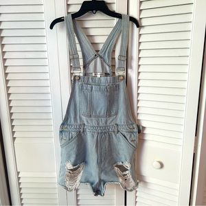 Women’s blue denim overalls. The Brand is Wild Honey- Size small